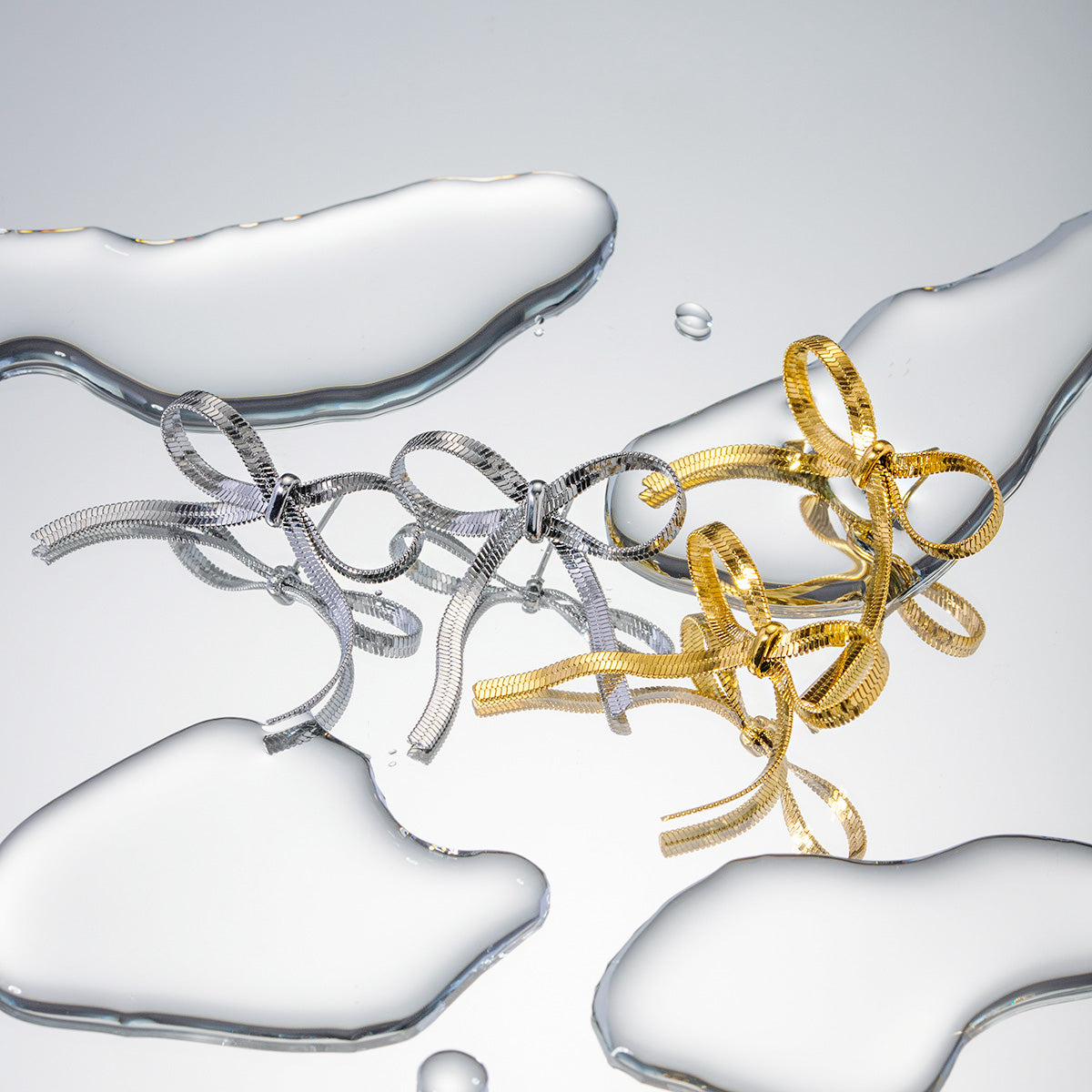 Stainless steel flat snake chain bow earrings (5 pairs)