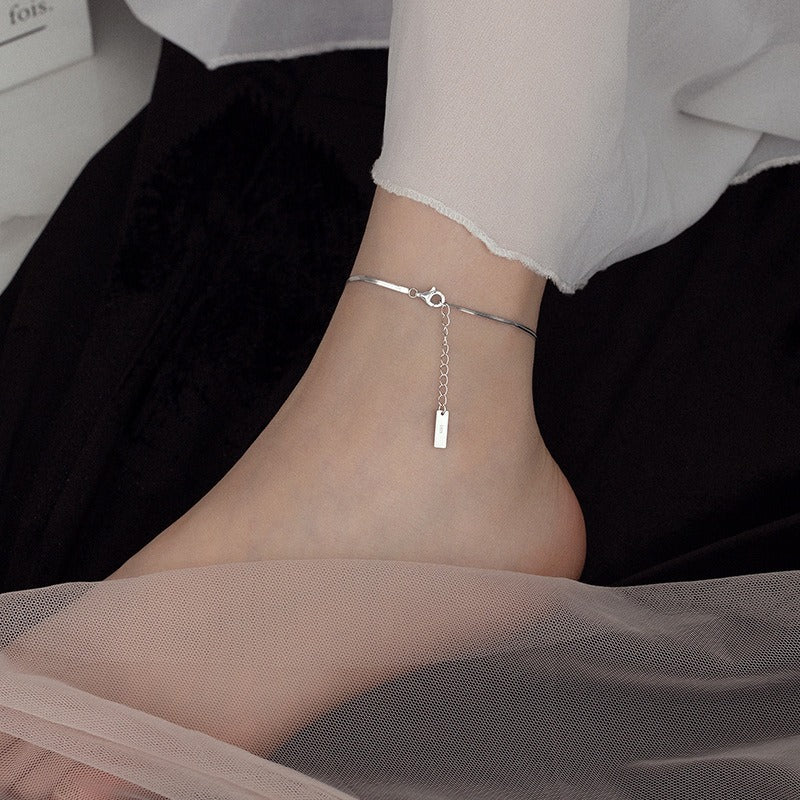 Dainty silver foot jewellery anklet worn with sandals for beach jewelry wholesale