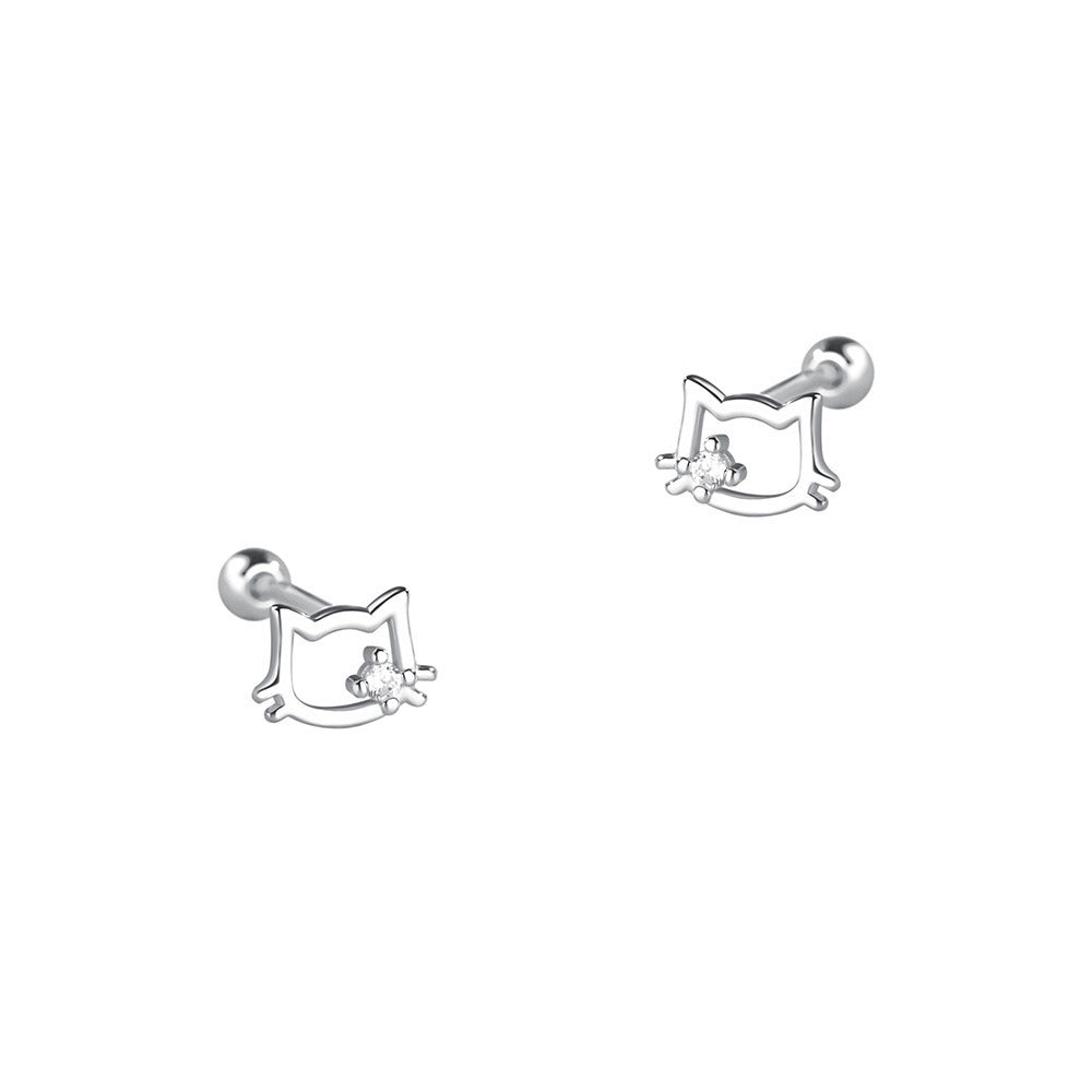 Sterling silver cat earrings styled with Christmas props, highlighting their charm as a stocking stuffer for pet moms