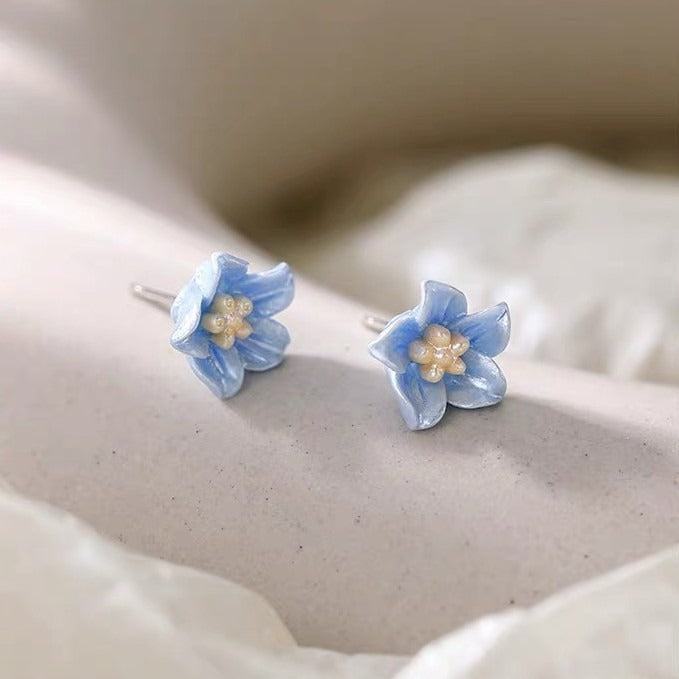 lightweight sterling silver floral earrings in blue, ideal for daily wear