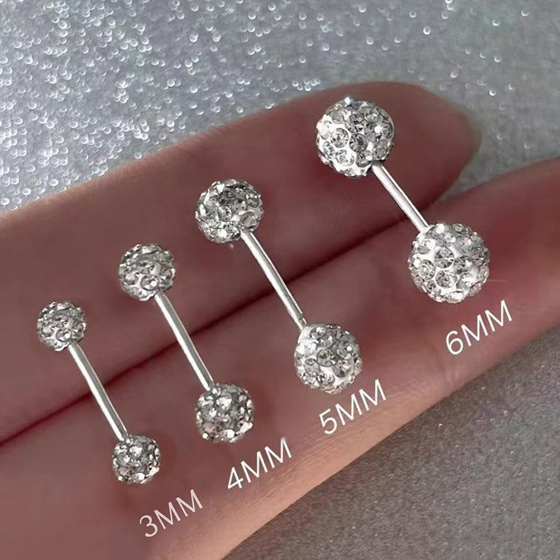 Close-up of rhinestone disco ball-style earrings with 999 silver posts, ideal for party or festive wear