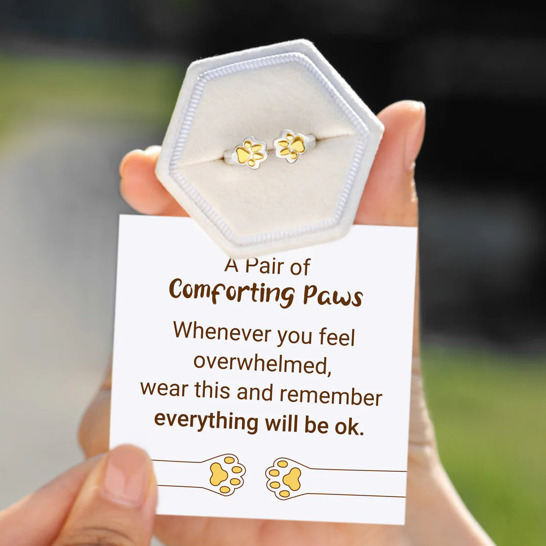 dainty pet jewelry ring with golden paw print detail and stackable silver band
