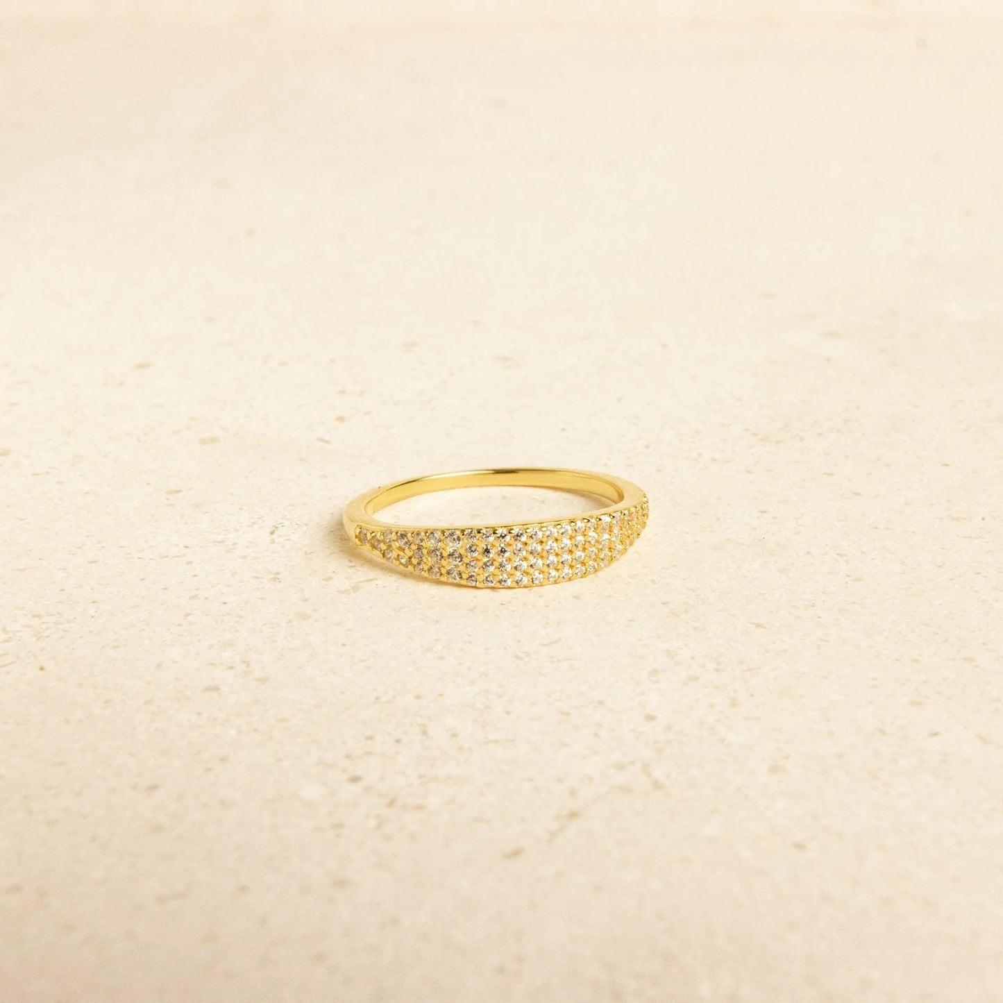 dainty gold engagement ring with full pavé cubic zirconia setting