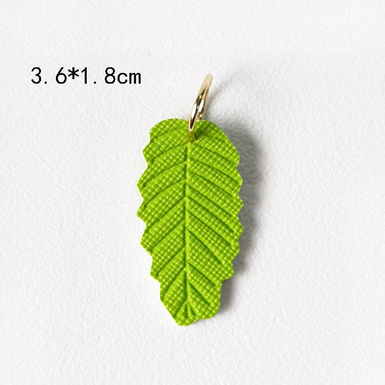 Creative PU Leather Keychain – Smiley Face, Strawberry, Orange, Flower Charms (5 pcs)