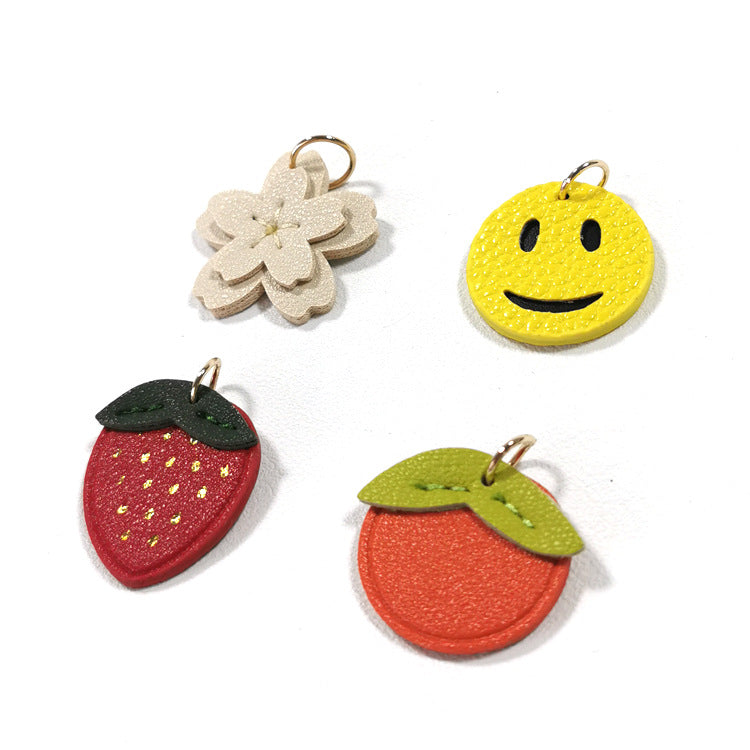 Creative PU Leather Keychain – Smiley Face, Strawberry, Orange, Flower Charms (5 pcs)