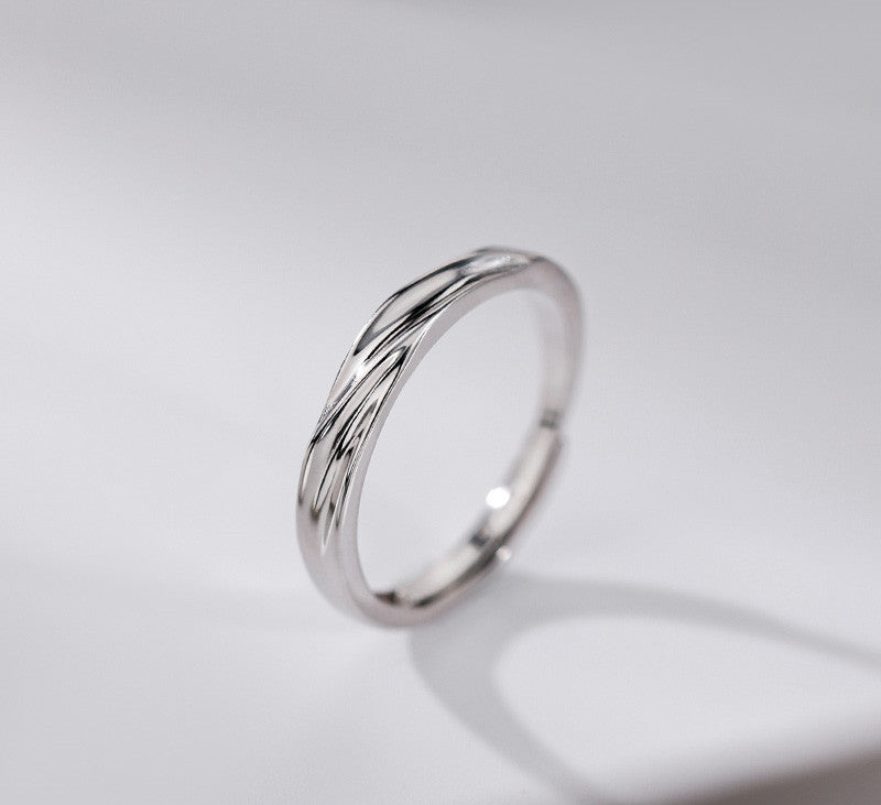 modern unisex sterling silver love rings set with polished and pavé details