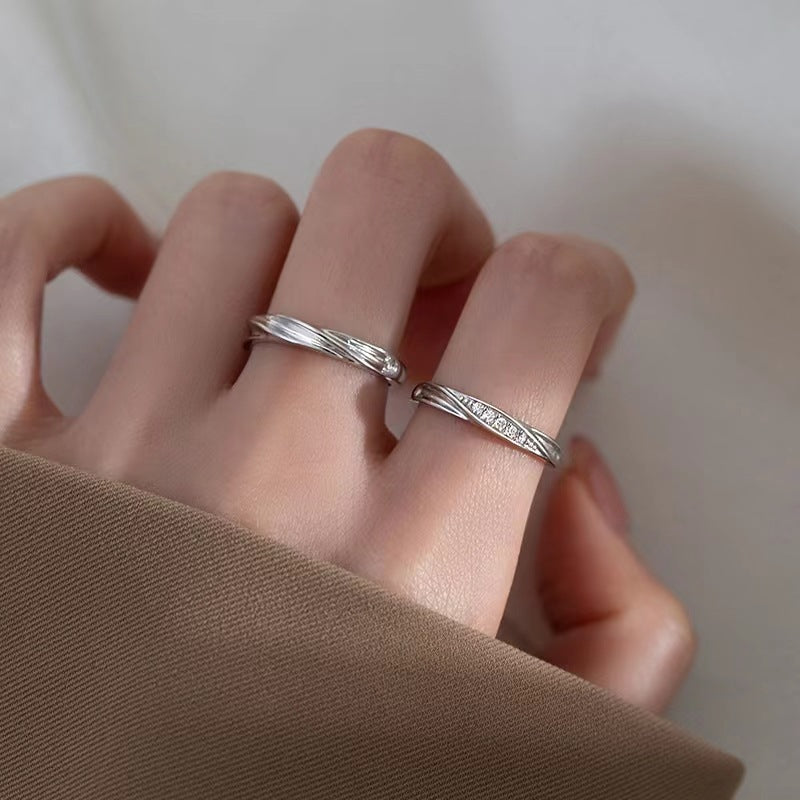 couple anniversary rings in 925 silver with curved design and zircon accents