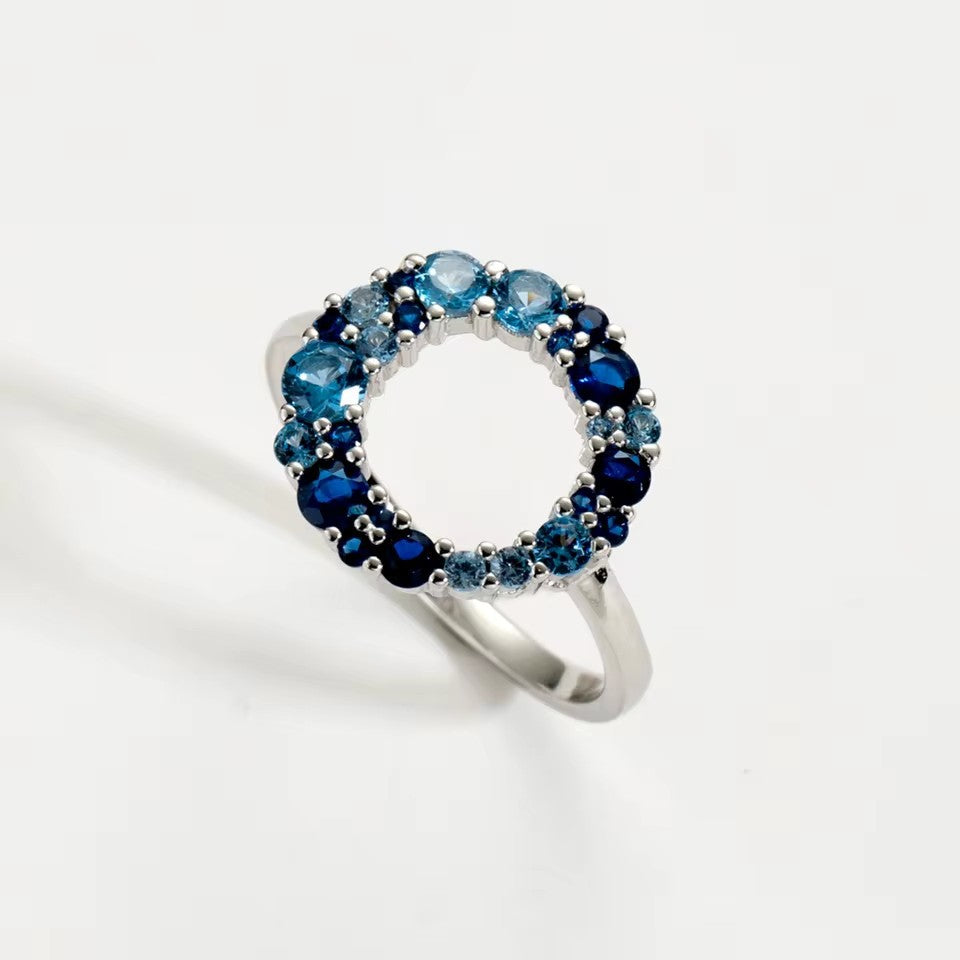 925 sterling silver blue CZ engagement ring with round brilliant cut stone