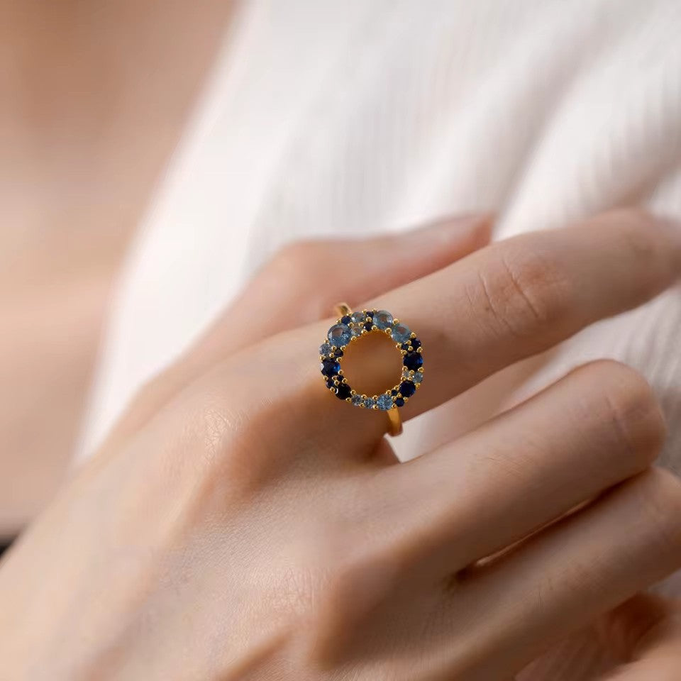 elegant sterling silver promise ring with blue round CZ for women