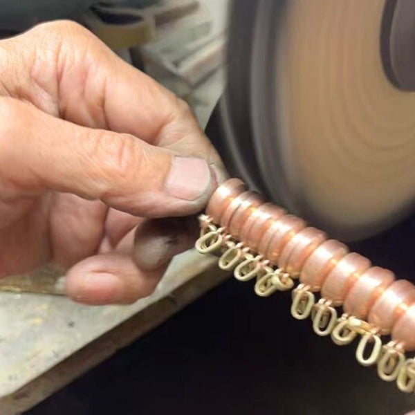 Hand Polishing Jewelry in Production