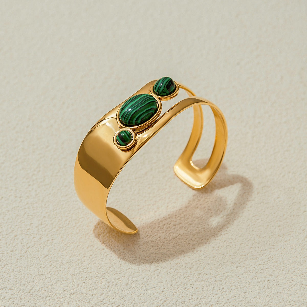 Single gold open bangle bracelet with natural green malachite stones from gold gemstone bracelet set of 5 perfect for Valentines gifts and wholesale jewelry.