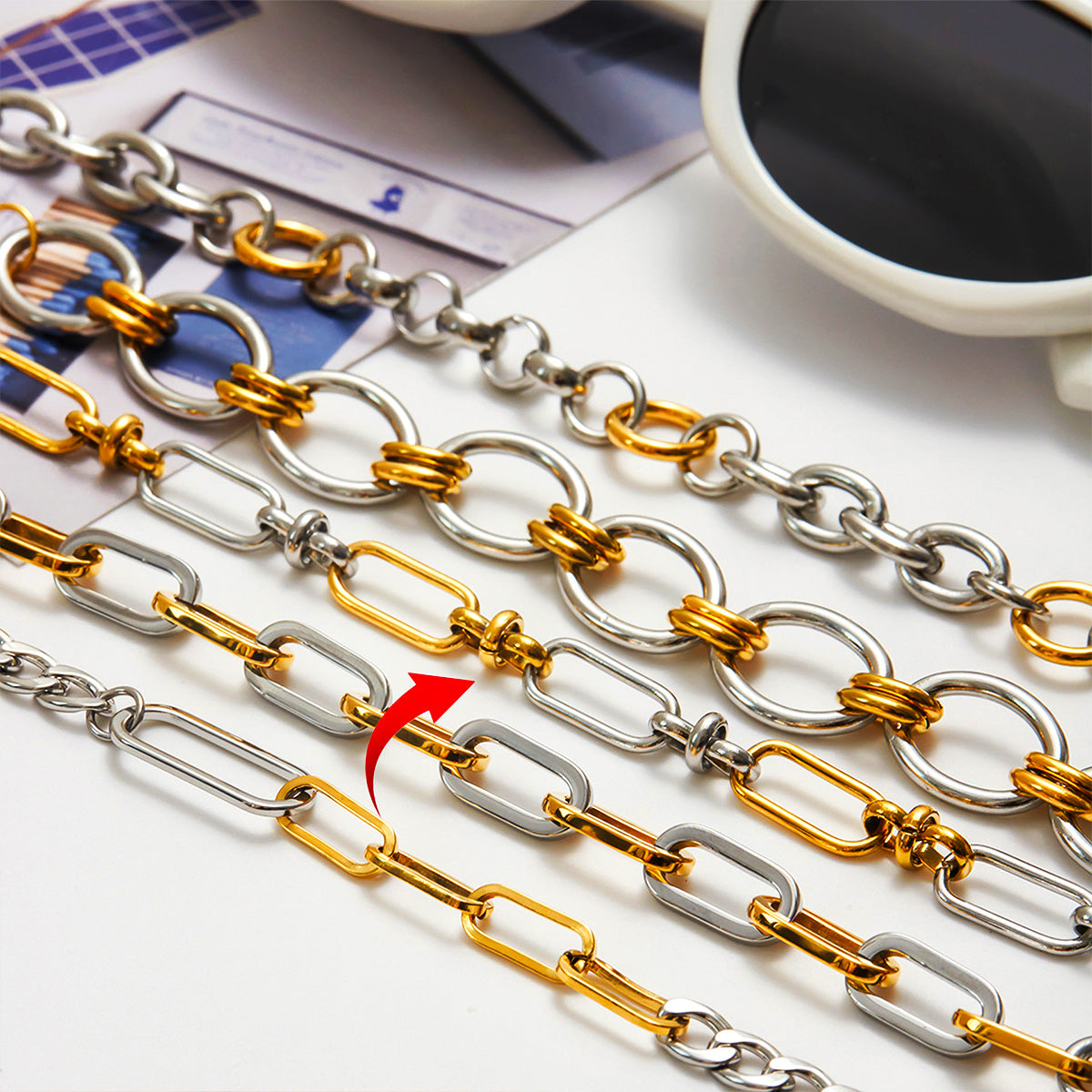 A full layout of five women's stacking bracelets in a two tone gold and silver bracelet set, each featuring a modern design and crafted for everyday stylish wear.