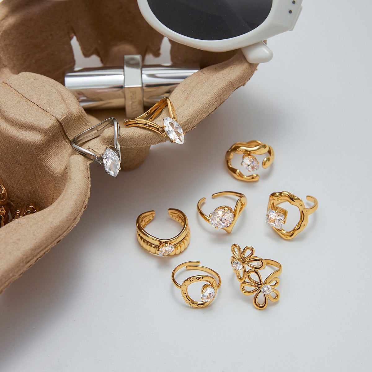 Set of 5 non tarnish zircon rings in titanium steel featuring elegant flower and minimalist designs, ideal for stacking jewelry lovers.