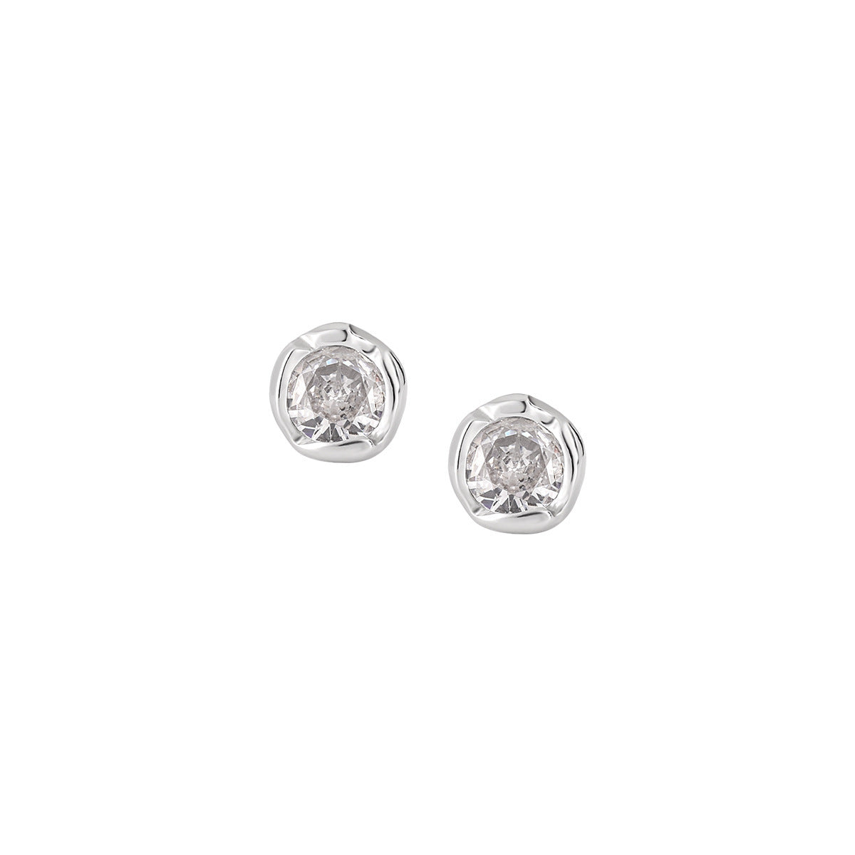 Minimalist stud earrings made of sterling silver with CZ stones on volcanic rock, perfect for daily wear earrings for women wholesale.