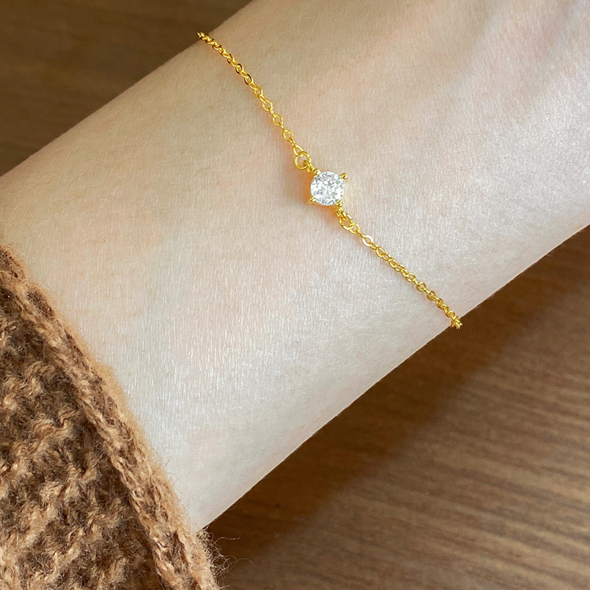 a woman wearing a Single Rhinestone gold Bracelets