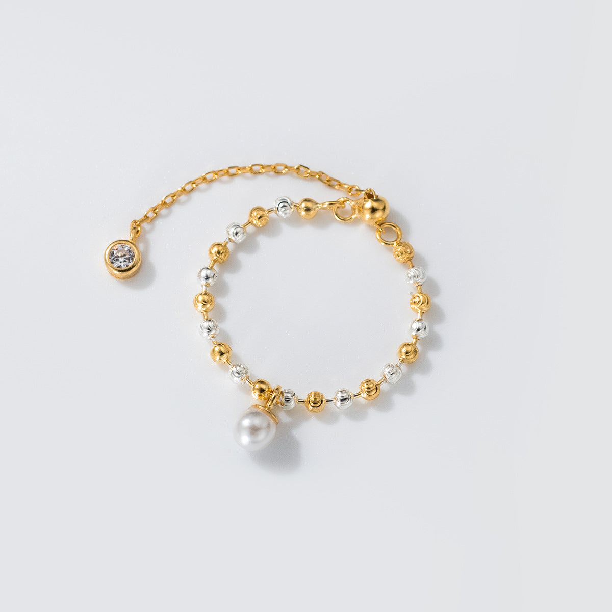 Wholesale two tone beaded pearl adjustable ring in 925 sterling silver – gold and silver beads with delicate pearl pendant