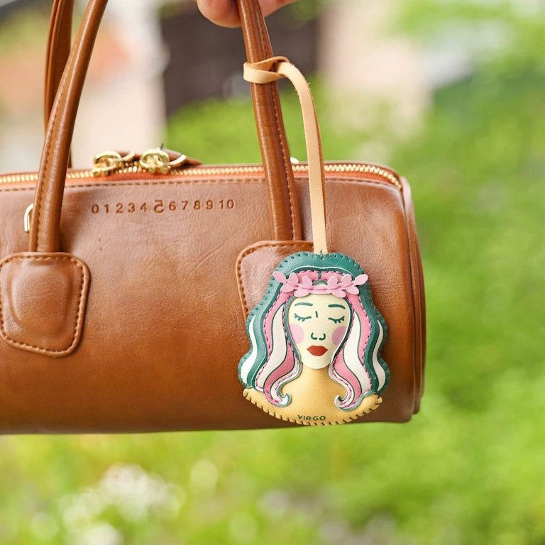 Leo zodiac bag charm wholesale design on brown handbag handmade leather keychain charm ideal for birthday gifts and boutique fashion accessories wholesale