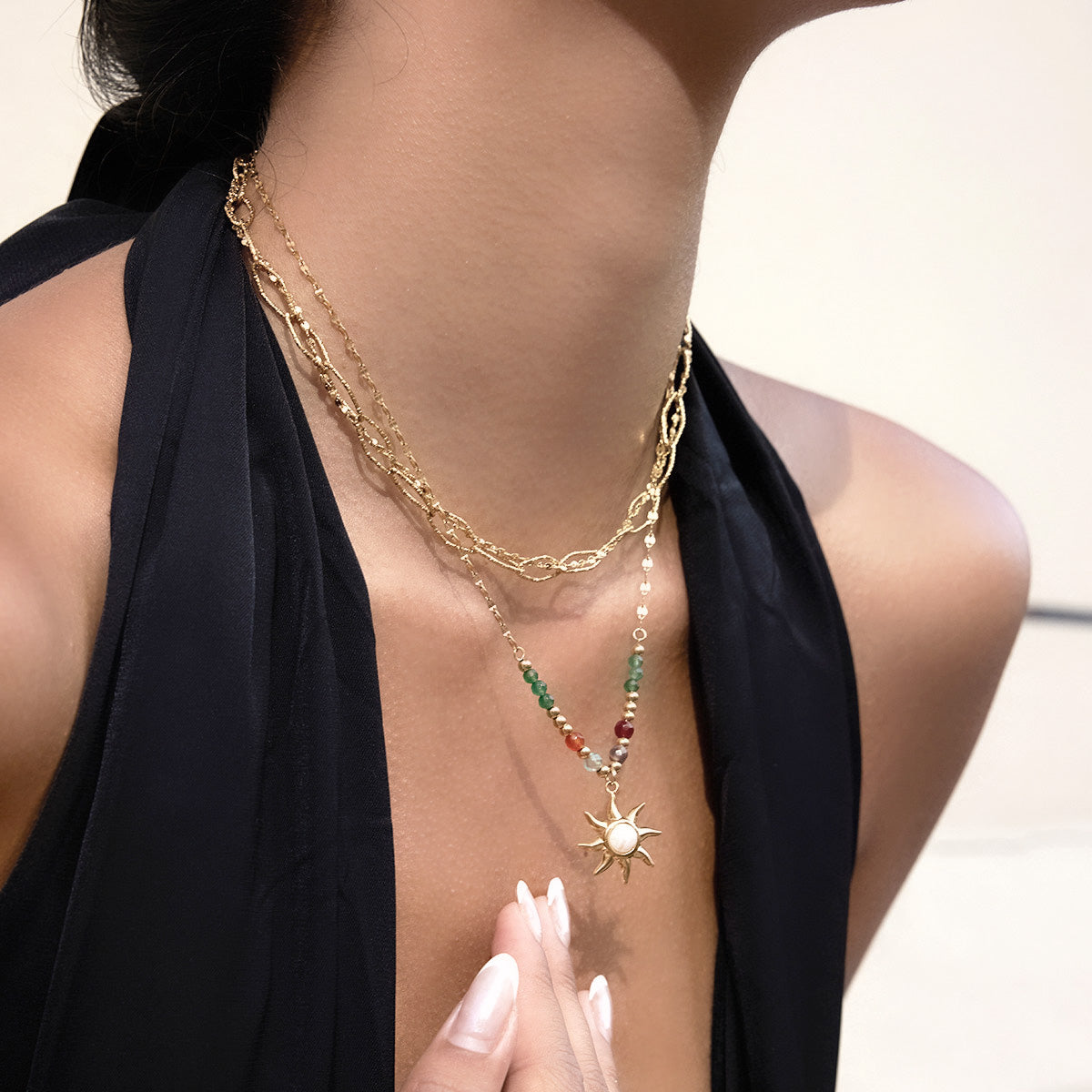 Colorful sun pendant beaded necklace made of non tarnish stainless steel with waterproof chain close-up