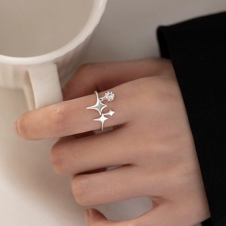 Wholesale sterling silver Cosmic Starlight Ring with layered star motif and cubic zirconia