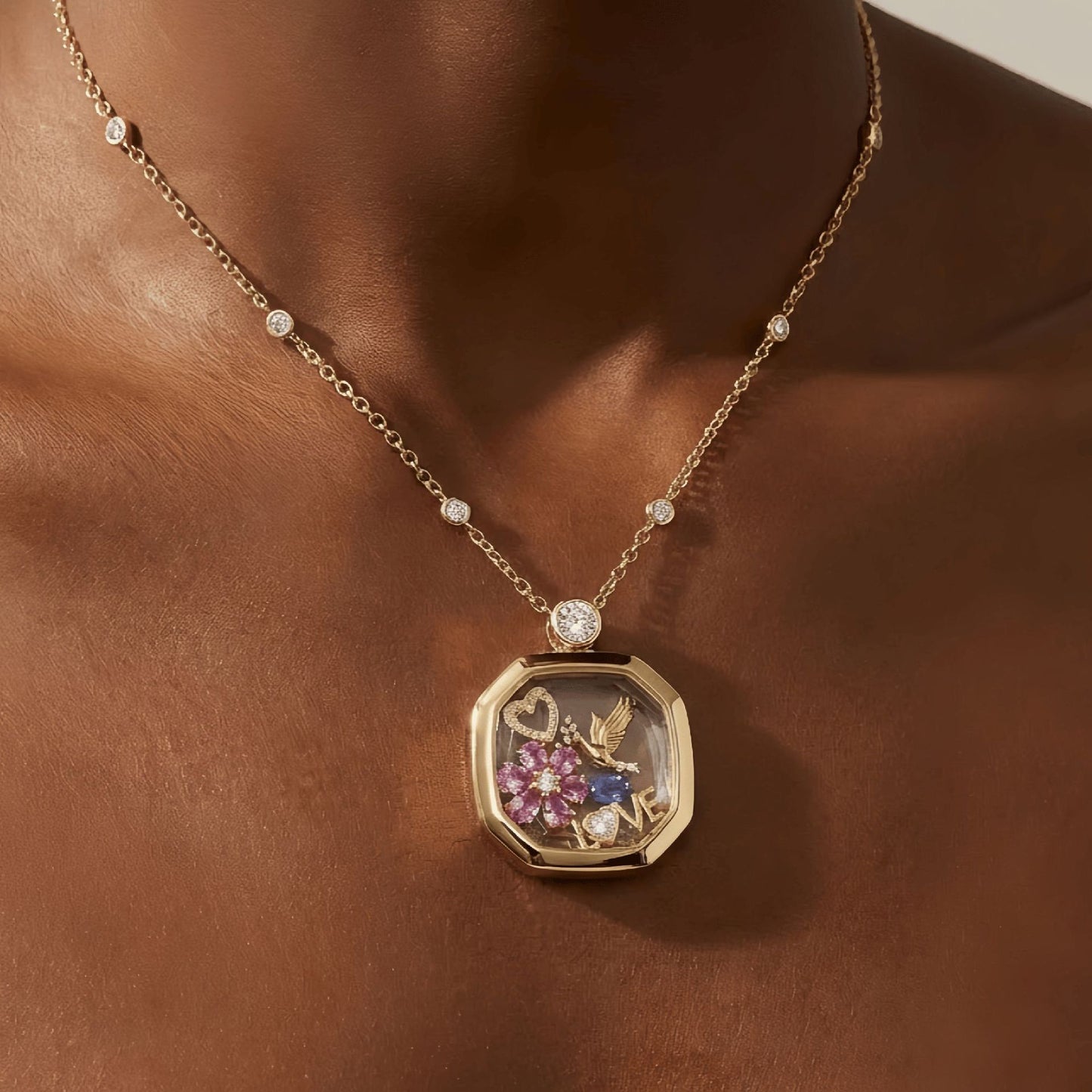 Model holding openable glass memory locket pendant on box chain necklace with zircon details
File name