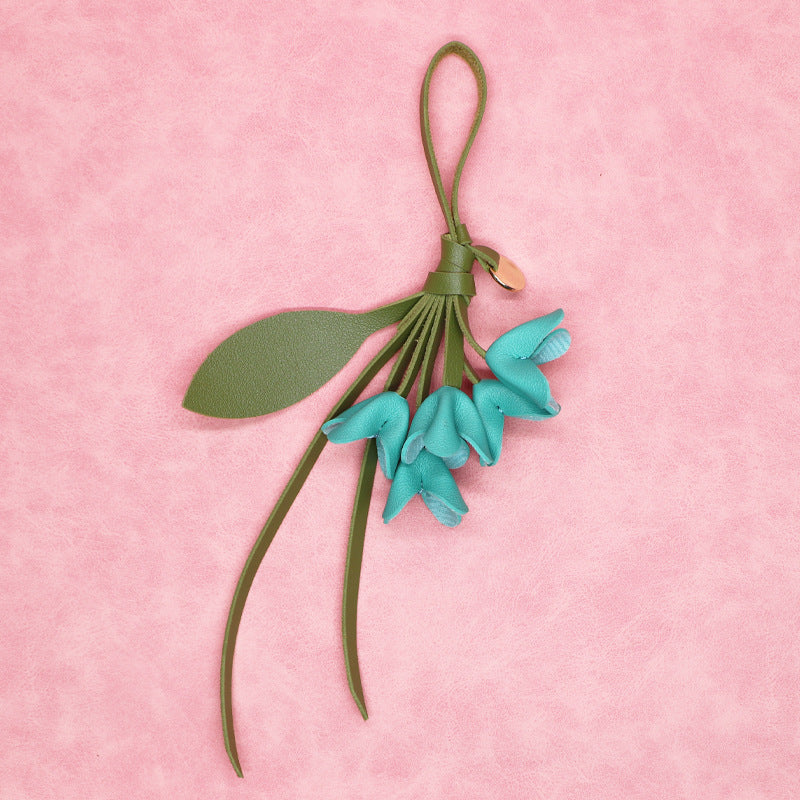 Teal PU flower bag charm keychain with green strap great for wholesale packs