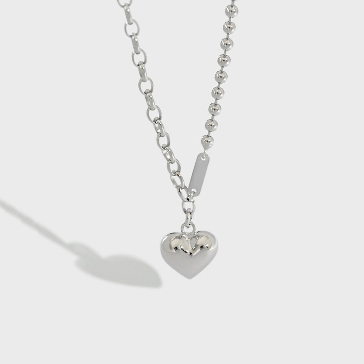 Silver heart necklace with half beaded and half chunky chain, designed for minimalist jewelry wholesale and daily wear.