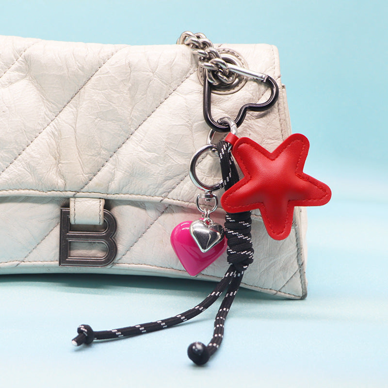 Red PU leather heart keychain with red rope strap and pink heart charm for women