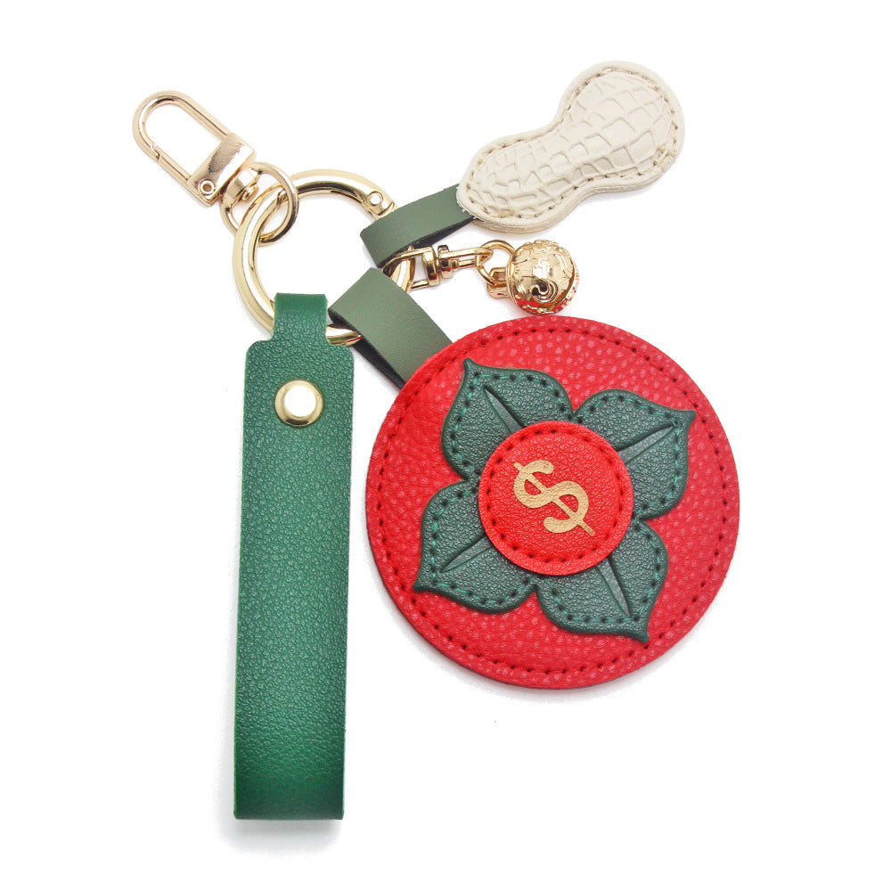 Persimmon and Peanut PU Leather Keychain - Red Round Charm with Green Leaf Motif