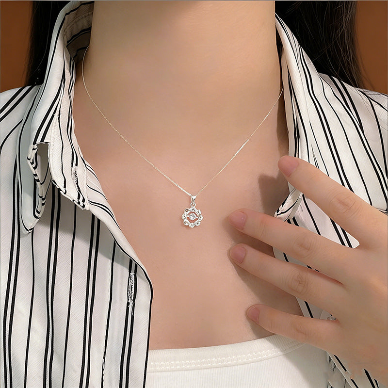S999 silver star pendant necklace worn with delicate clavicle chain styling