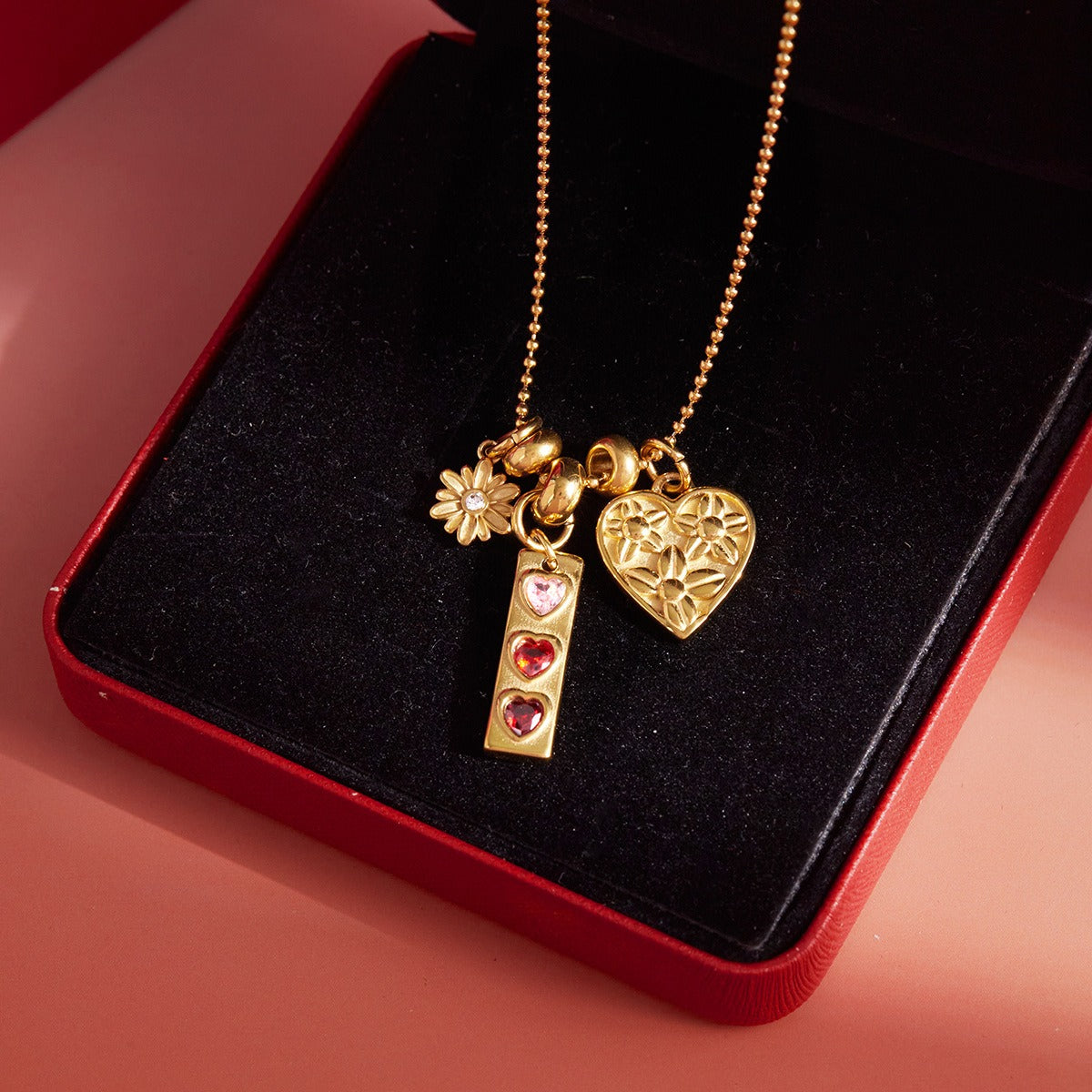 Valentine heart charm necklace lifestyle close up with heart crystal and charm cluster details