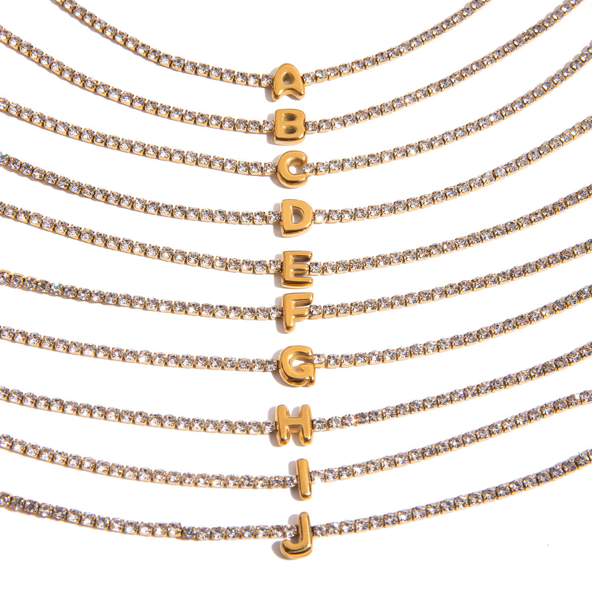 Wholesale 18K gold plated stainless steel initial bracelets A to J in a sparkling personalized name jewelry set of 5