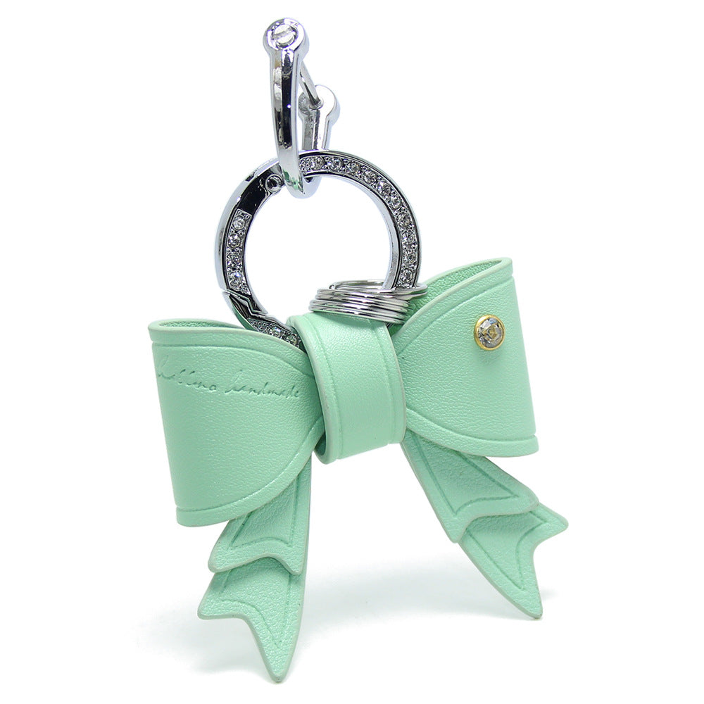 Wholesale mint green bow keychain, stylish PU leather purse keychain and bag charm for women