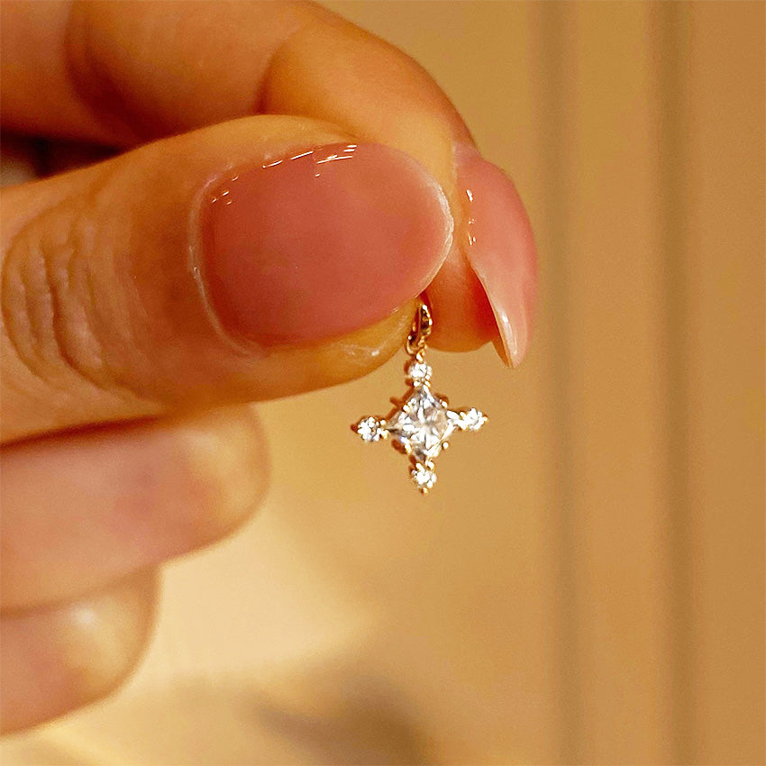 Close view of 18K gold plated princess zircon cross pendant