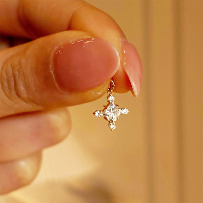 Close view of 18K gold plated princess zircon cross pendant