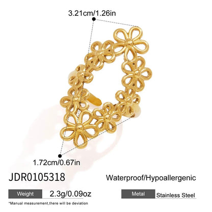 Openwork stainless steel floral ring with 3.21 cm length and 1.72 cm width