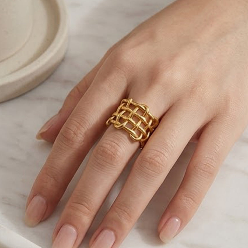 18K gold plated open weave stainless steel ring worn as a bold accessory