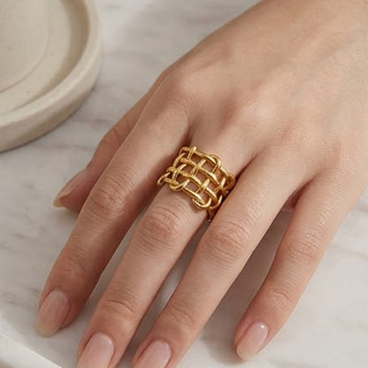 18K gold plated open weave stainless steel ring worn as a bold accessory