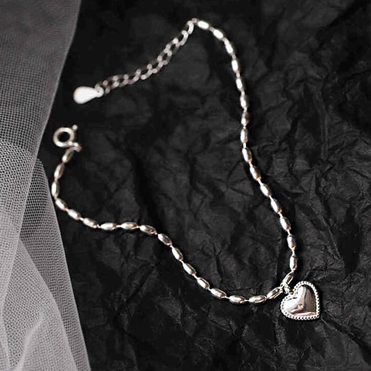 Pulsera con colgante de corazón y cadena de cuentas de arroz de plata 925. Juego de 10