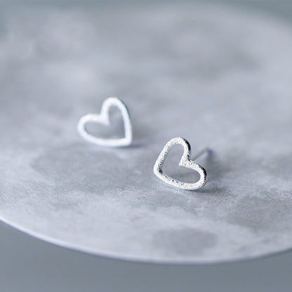 Pendientes pequeños con forma de corazón hueco de plata de ley 925 (10 pares)