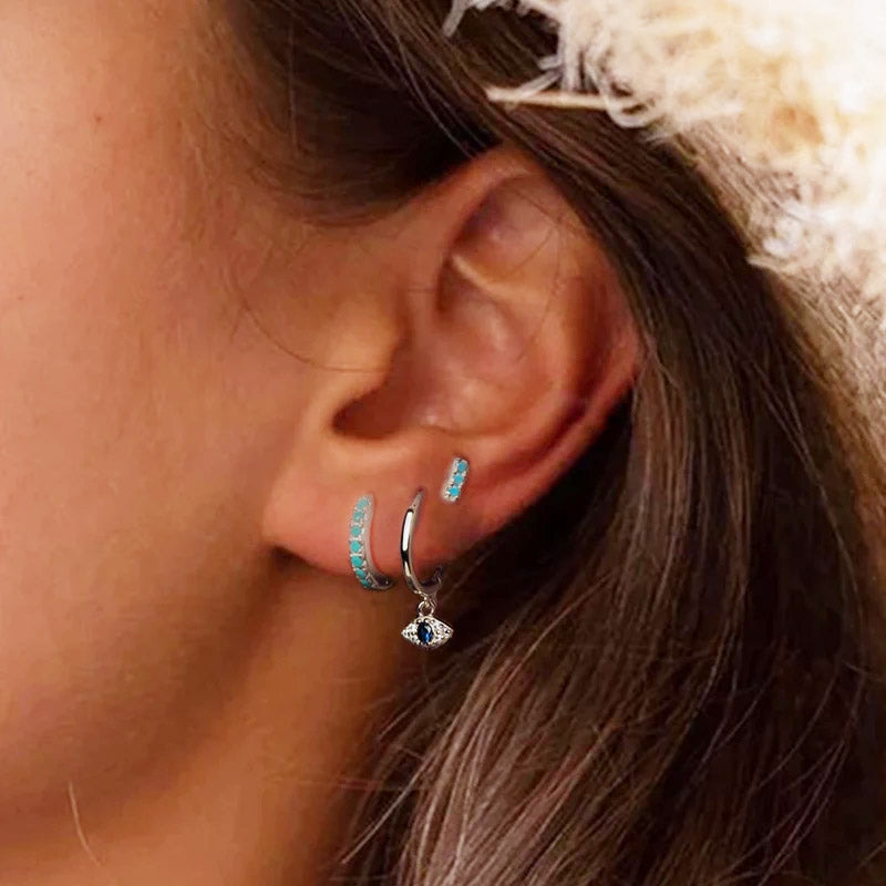 Pendientes aros mal de ojo con circonitas azules en plata de ley 925 (10 pares)