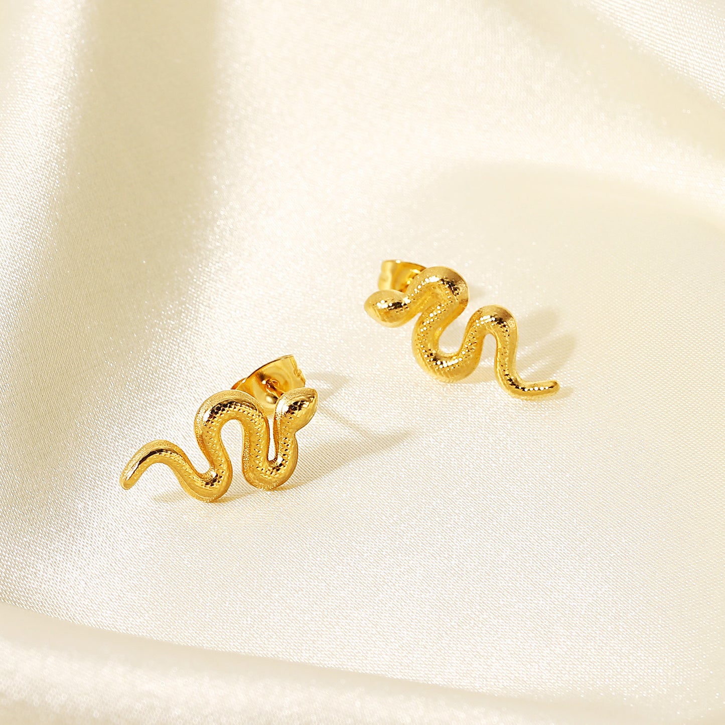 Stainless steel gold distorted snake stud earrings (5 pairs)