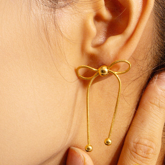 Pendientes tipo pajarita con nudo dorado y acero inoxidable (10 pares)