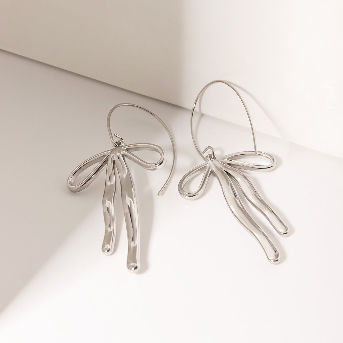 Stainless steel elegant knot bow drop earrings (5 pairs)