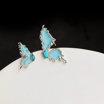 Silver plated blue enamel with zircon stone asymmetrical butterfly stud earrings (5 pairs)