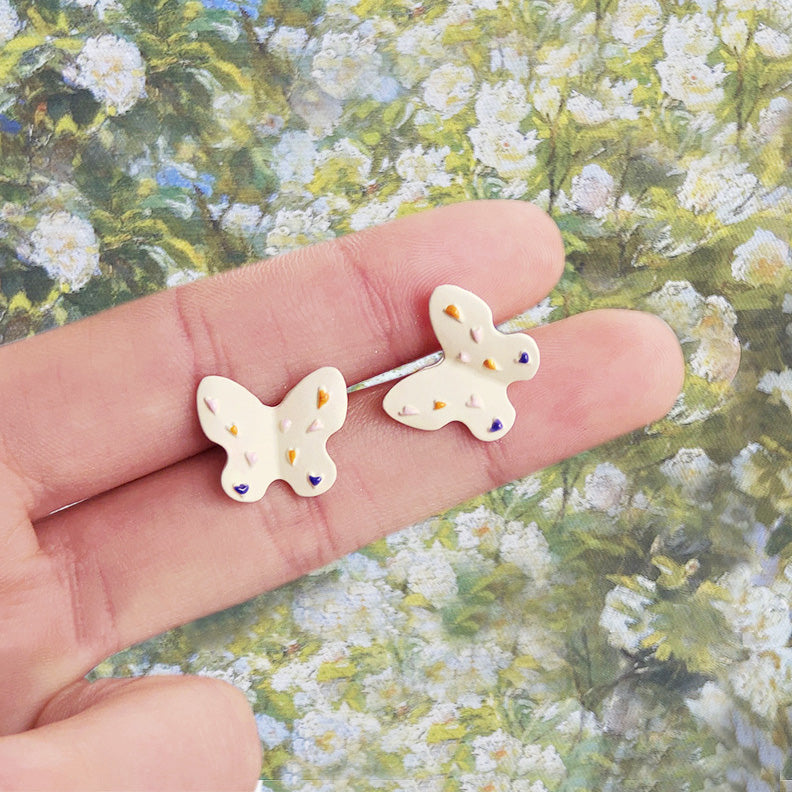 Wholesale white enamel butterfly piercing stud earrings (5 pairs)