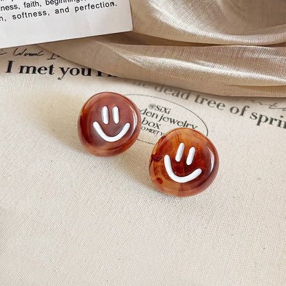 Brown acrylic smiley with white enamel button stud earrings (5 pairs)