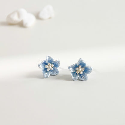 Light blue resin small floral flower stud earrings (5 pairs)