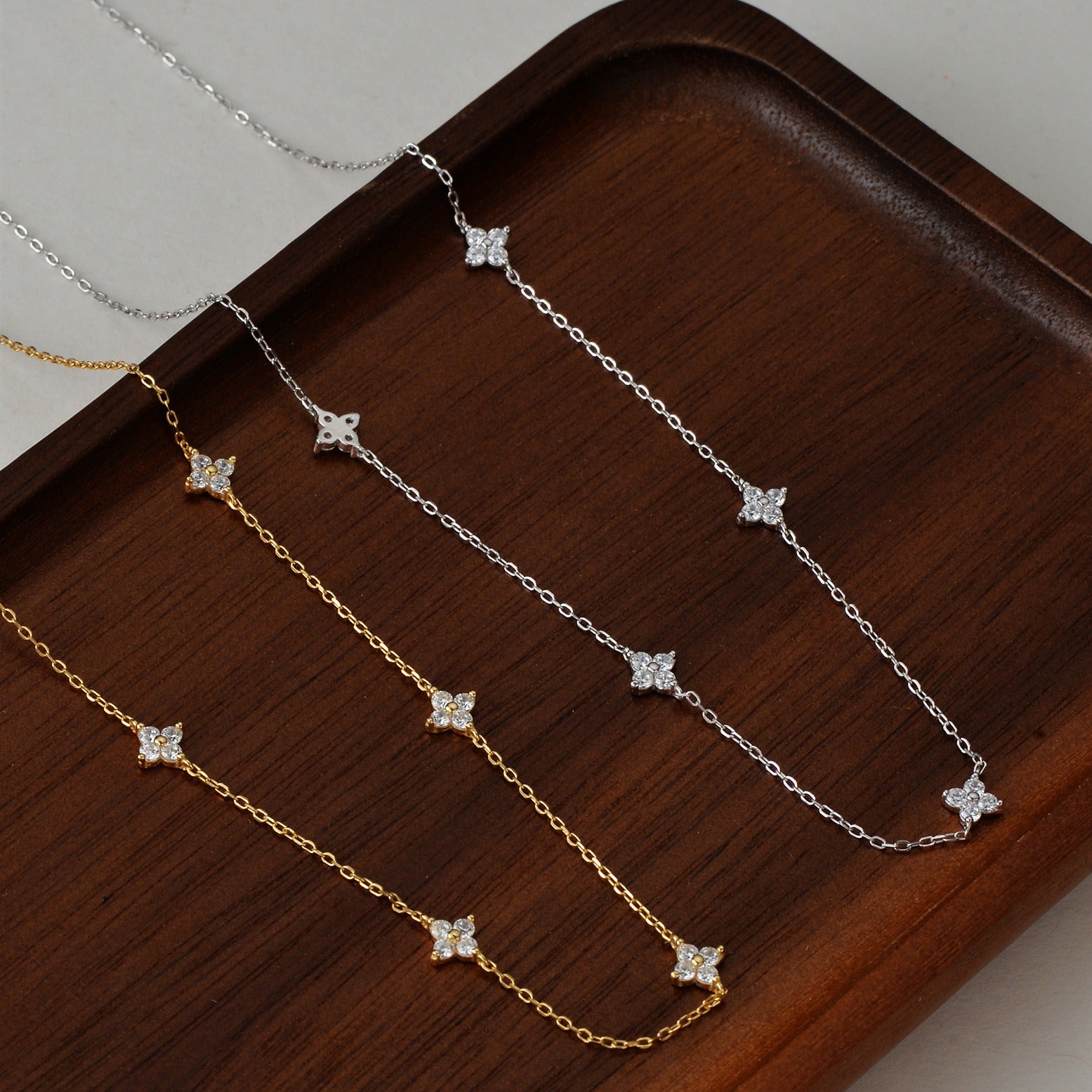 Dainty silver beach anklet for women with lucky four leaf clover charm