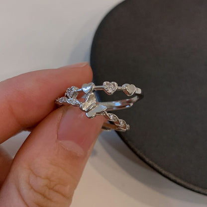 stackable personalized friendship rings set in sterling silver with butterfly and heart motifs