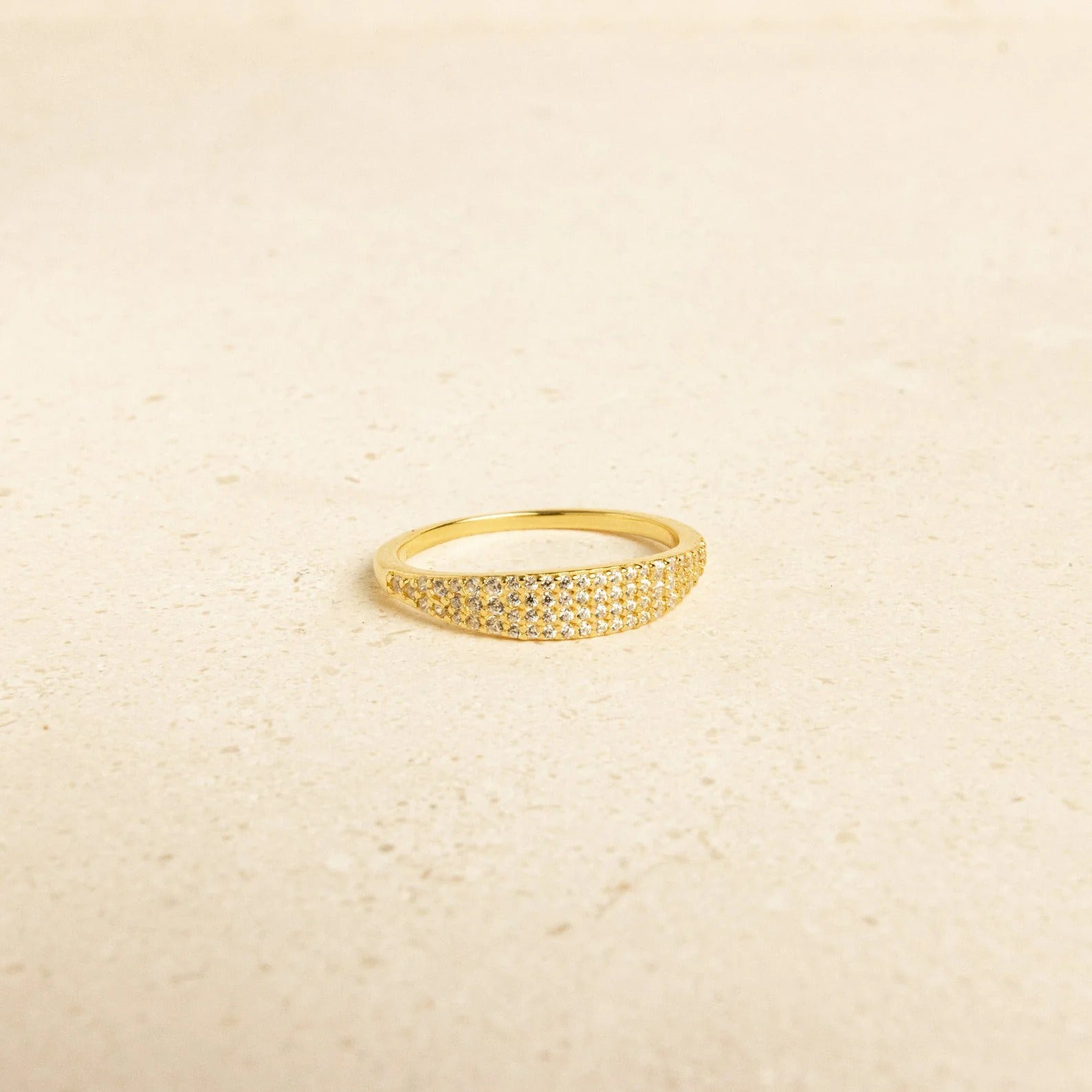 dainty gold engagement ring with full pavé cubic zirconia setting